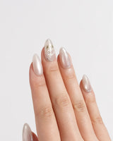 Morning Air handmade press-on nails featuring Fresh Creamy Nude, Hand-painted Metallic Daisies & Simple gold Wire.