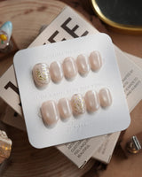 Morning Air press-on nails in extra short oval shape — Fresh Creamy Nude, Hand-painted Metallic Daisies & Simple gold Wire.