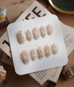 Morning Air press-on nails in extra short oval shape — Fresh Creamy Nude, Hand-painted Metallic Daisies & Simple gold Wire.