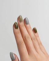 Moss Code nail art close-up showing Vintage Olive Green & Silver Glitter, Minimalist Reflective Skittles Style. details