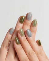 Moss Code handmade press-on nails featuring Vintage Olive Green & Silver Glitter, Minimalist Reflective Skittles Style.