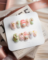 My Lulu extra short oval press-on nails with pastel kittens and stars