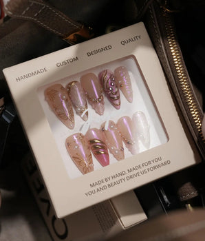 Neon Kiss handmade press-on nails featuring pink chrome butterfly pearl gold lines 3D sculpted