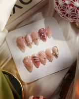 Neon Kiss press-on nails with sculpted butterfly wings, gold linework and pearly pink chrome