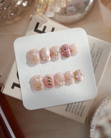 Neon Kiss extra short squoval press-on nails with pink chrome butterfly wings and gold lines