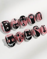 Night Prowler handmade press-on nails featuring dusty pink black cat hand-painted 3D details nails