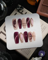 Nightcap handmade press-on nails in medium coffin shape by Joyee Nails