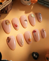 Treat Box press-on nails — nude base mixed mini