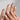 Nude Spark handmade press-on nails featuring Premium Champagne Cat Eye, Irregular French Metal Outlines.