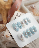 Ocean Heart medium almond press-on nails with jeweled underwater chrome sea life