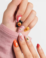 Omakase extra short almond nail set with glossy sushi charms and coral accents