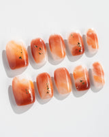 Onyx Shine in extra short square shape with amber marble color and glossy finish
