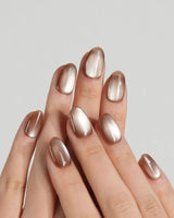 Orbs Team #1 nail art close-up showing brown cat eye details