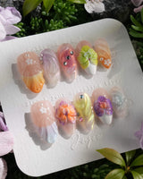 Orchid-Extra Glow nail art close-up showing Colorful Summer, 3D Orchids & Shell Textures. details