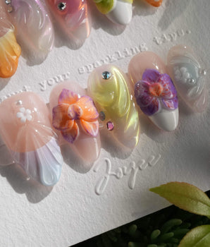 Orchid-Extra Glow handmade press-on nails featuring Colorful Summer, 3D Orchids & Shell Textures.