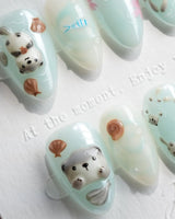 Otter Momo nail set with cuddling otters, tiny snacks, and jelly water texture