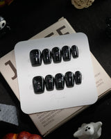 Party Spirits handmade press-on nails in extra short coffin shape by Joyee Nails