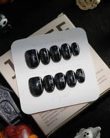 Party Spirits handmade press-on nails in extra short oval shape by Joyee Nails