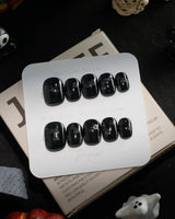 Party Spirits handmade press-on nails in extra short squoval shape by Joyee Nails