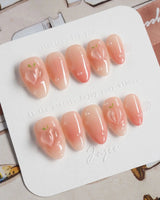 Peach Dew summer press-on nails with ripe peach tones and delicate 3D details