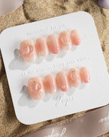 Peach Dew close-up of peach gradient nail art with raised fruit and water droplets