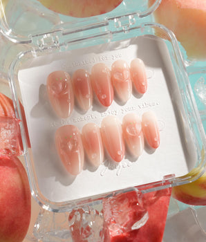 Peach Dew handmade press-on nails featuring Peach Gradient, 3D Peaches & Dewdrops.
