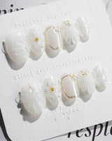 Pearl Bloom press-on nails in extra short oval shape — Pure White Pearlescent, 3D Flowers & Shell Texture.