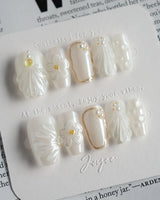 Pearl Bloom press-on nails in short coffin shape — Pure White Pearlescent, 3D Flowers & Shell Texture.