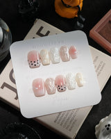 Pearl Dot handmade press-on nails in extra short coffin shape by Joyee Nails