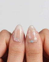 Petal Rain nail art close-up showing nude, 3D White Butterfly Wings & Pastel Wildflowers. details