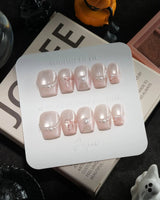 Pillow Talk handmade press-on nails in extra short coffin shape by Joyee Nails