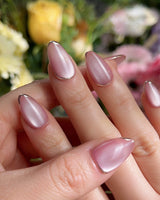 Glowing Stone - New Edition nail art close-up showing Gentle Rose Cat Eye, Simple Silver Outlines. details