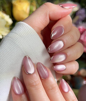 Glowing Stone - New Edition handmade press-on nails featuring Gentle Rose Cat Eye, Simple Silver Outlines.