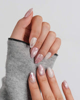 Pink Treasure glossy marble press-on nails with starfish pendant and pearl shell texture