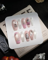 Pinkoween handmade press-on nails in medium coffin shape by Joyee Nails