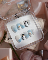 Polar Friends nails in extra short almond — Icy Blue & Pure
