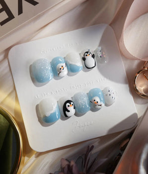 Polar Friends nails in extra short squoval — Icy Blue & Pure