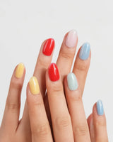 Popsicle glossy color block press-on nails in mint, red, yellow, blue, and nude