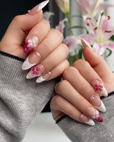 Duchess Purple close-up of sculpted purple flowers and glossy feminine nail art