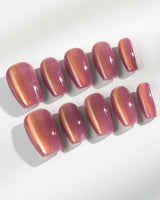 Rose Brew press-on nails in short coffin shape — Maroon cat eye nails