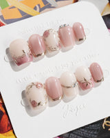 Rose-Théâtre Noir press-on nails in extra short coffin shape — Elegant Rose Pink, Embossed Florals & Metallic Edging.