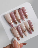 Rose-Théâtre Noir press-on nails in long stiletto shape — Elegant Rose Pink, Embossed Florals & Metallic Edging.