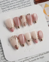 Rose-Théâtre Noir press-on nails in short stiletto shape — Elegant Rose Pink, Embossed Florals & Metallic Edging.