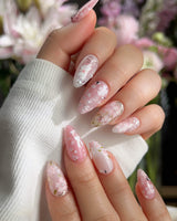 Sakura-Cipher handmade press-on nails featuring Sweet Cherry Blossom Pink, Hand-painted Bunnies & Metallic Butterfly Wings.