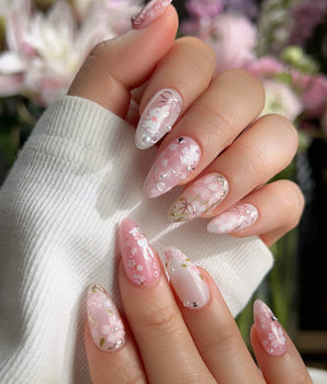 Sakura-Cipher handmade press-on nails featuring Sweet Cherry Blossom Pink, Hand-painted Bunnies & Metallic Butterfly Wings.