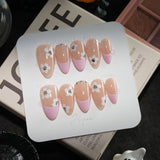 Sakura Fall handmade press-on nails in short almond shape by Joyee Nails