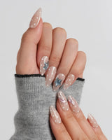 Salt & Sand coastal nail set with chrome starfish, dolphin accent, and polka dots