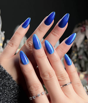 Royal Blue handmade press-on nails featuring Deep Starry Blue, Cat Eye Glossy Effect.
