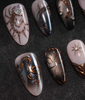 Scorpio press on nails with a hand-painted copper scorpion, barbed wire, bats, snake and thorns on nude and smoked black cat eye - image 1