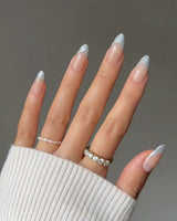 Sea Salt short almond press-on nails with icy sky blue French tips